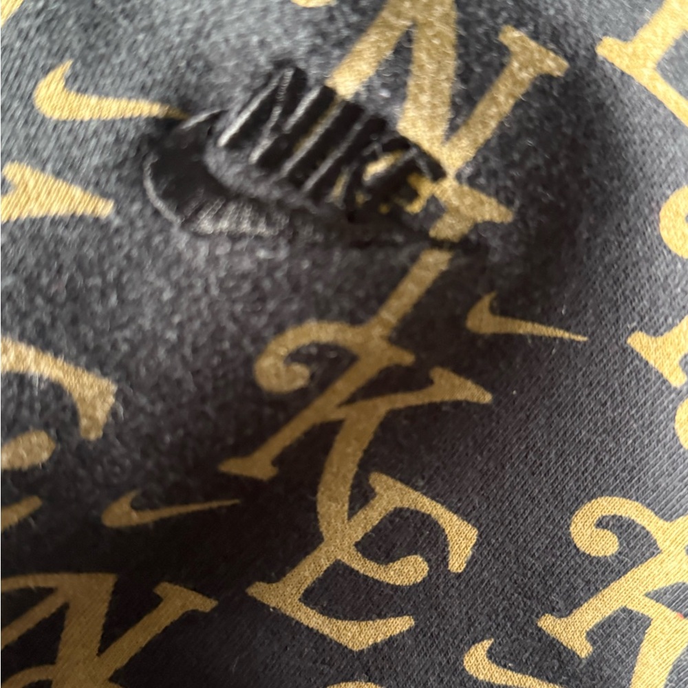 Nike Black and Gold Patterned Hoodie